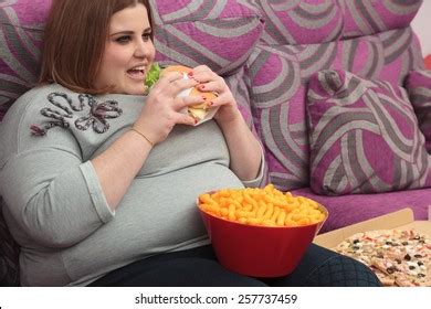 Fat women eating Snímků stock fotografií a vektorů Shutterstock
