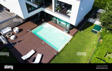 Exterior Modern White Villa With Pool And Garden Nobody Inside Stock