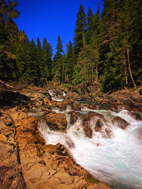 Clear Water And Colorful Rocks At Silver Falls Mt Rainier National Park