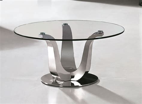 A Glass Table Sitting On Top Of A White Floor