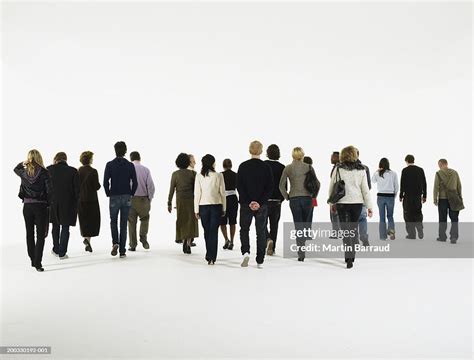 Group Of People Walking Rear View High Res Stock Photo Getty Images