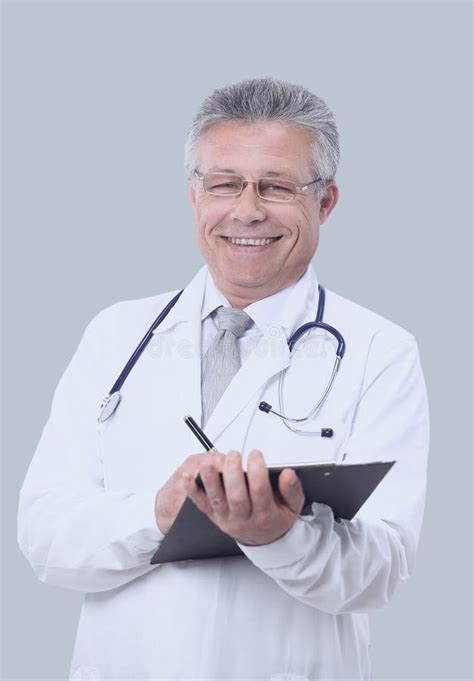 Portrait Of Confident Medical Doctor On White Background Stock Image