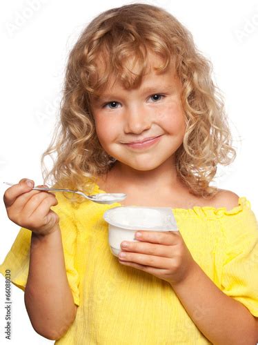 Little Girl Eating Yogurt Stock Photo Adobe Stock