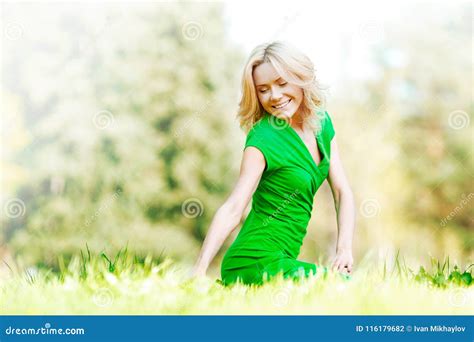 Woman Sitting On Grass Stock Photo Image Of Beauty 116179682