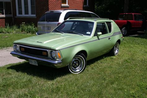 By bringing my little blue gremlin to the chrysler show, i knew i was contributing. Gremlin_X 1973 AMC Gremlin Specs, Photos, Modification ...