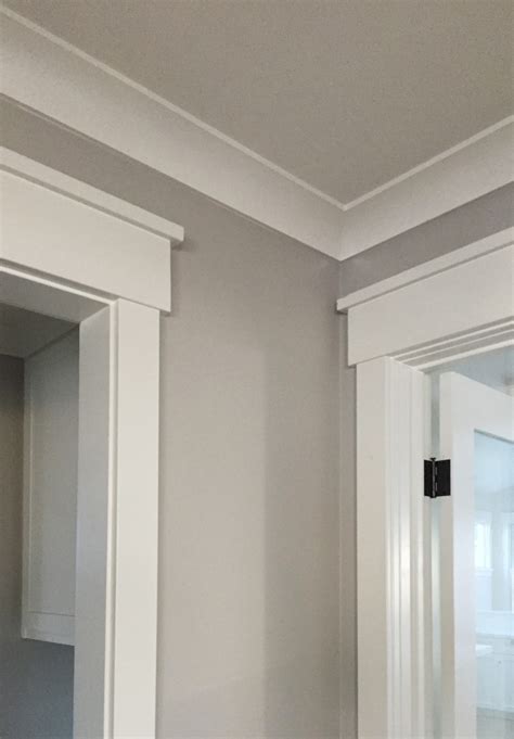 The first is to hide the part in the ceiling where it meets the wall. craftsman style trim - WindsorONE