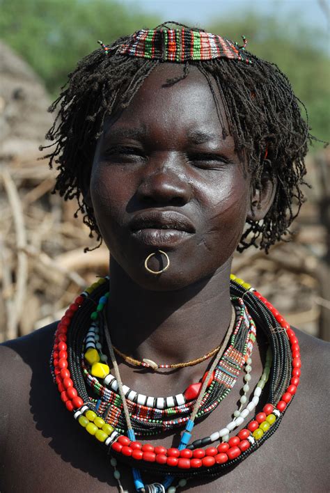Africa Toposa woman Kapoeta South Sudan Native Eye Travel Øreringe