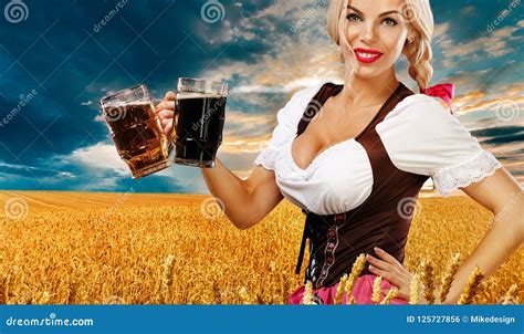 beer party oktoberfest woman waitress in munich wearing a traditional german bavarian dress