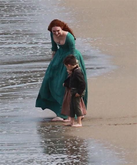 Poldark And His Wife Demelza Share A Passionate Kiss On The Beach In Cornwall As The Massive