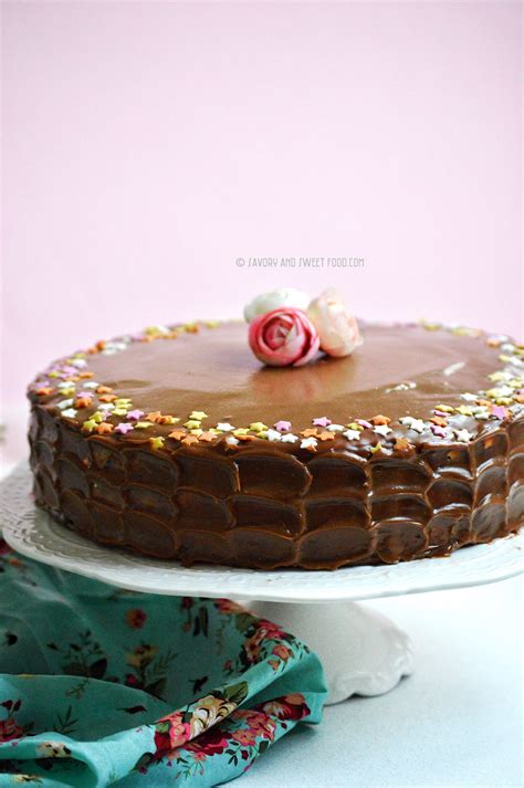 This post may contain affiliate links. Moist Chocolate Cake with Nutella Buttercream Frosting and ...