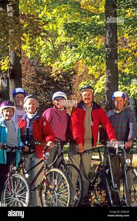 Group Seniors Bicycling In New England In Fall Hi Res Stock Photography