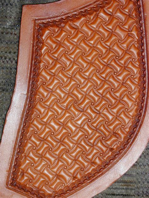 The raised design imprints the leathercraft pattern into damp leather. Tooling Patterns « J.J. Maxwell Tack & Saddle Co. J.J ...