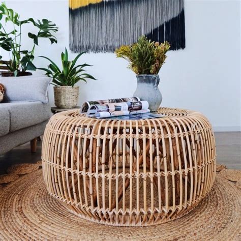 This set includes a coffee table and two chairs. Luxury Cottage Innovative 34" Round Woven Rattan Accent ...