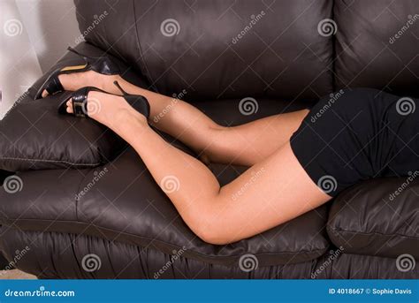 Legs On Leather Sofa Stock Image Image Of Beautiful