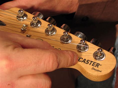 Restringing a guitar can be very tricky but if you learn it once, you can easily change strings whenever required. How to Restring an Electric Guitar that Has String ...