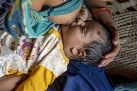 Indian Women Breastfeeding Their Husband