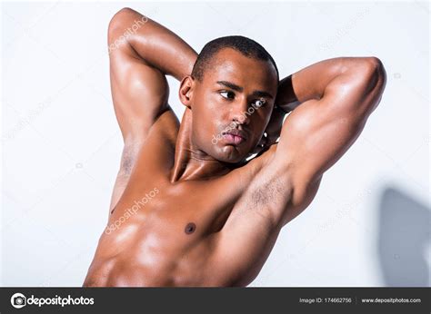 Handsome Shirtless African American Sportsman Hands Head Looking Away