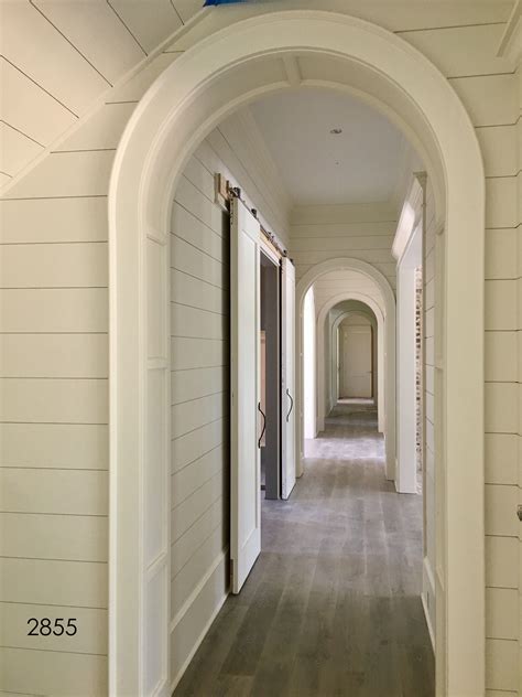 Half Round Arched Openings Are The Perfect Compliment To This Farmhouse