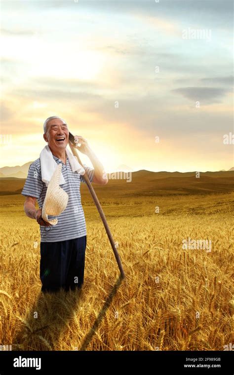 Farmers Stand In The Catcher In The Mobile Phone Stock Photo Alamy