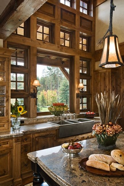 While the main appeal of a modern kitchen is its minimalist look, it still has to be functional. Large window over kitchen sink - FaveThing.com