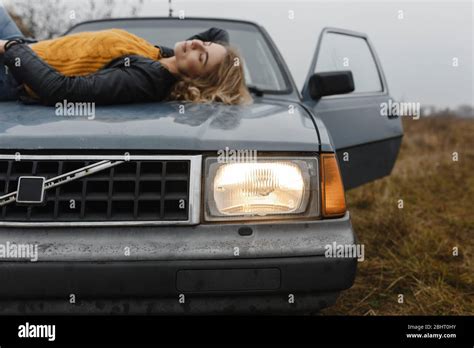 Woman Lying On Hood Car Hi Res Stock Photography And Images Alamy