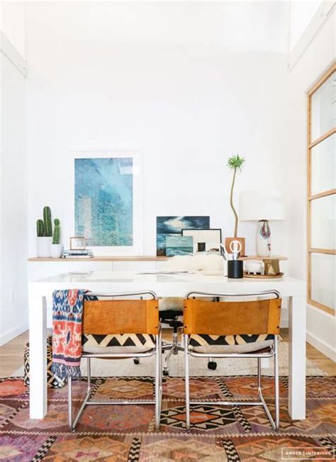 Boho Home Office With Boho Rug And Modern Leather Desk Chairs With