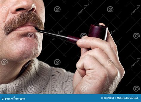 Man Holding Smoking Pipe In Hand Isolated On Black Stock Image Image