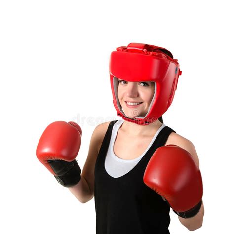 Young Beautiful Girl In Red Boxing Gloves Is Training A Kick Stock