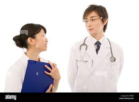 Doctor And Female Nurse Talking Stock Photo Alamy