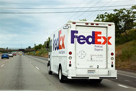 Fedex stands for federal express corporation and is the largest cargo carrier in the world. Royalty Free Fedex Truck Pictures, Images and Stock Photos ...
