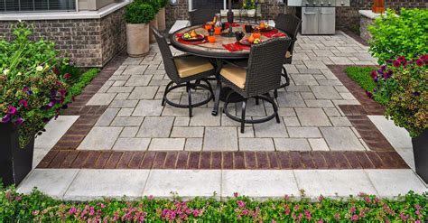 A sloping design for the patio lets the water drain away quickly without pooling in ugly spots on the pavers. 10 Patios That Use Paver Patterns to Make a Statement ...