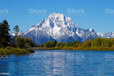 Mount Moran Rising Above The Snake River Stock Photo Download Image