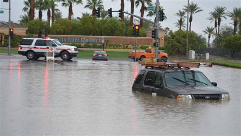 Rain In Palm Desert Floods Roads Strands Vehicles