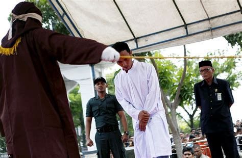 Indonesians Lashed For Breaking Sharia Law Daily Mail Online