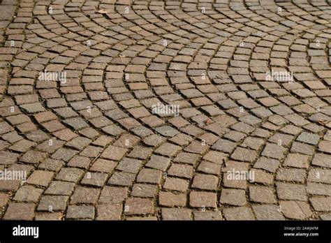Abstract Background Of Old Cobblestone Pavement Close Up Stock Photo