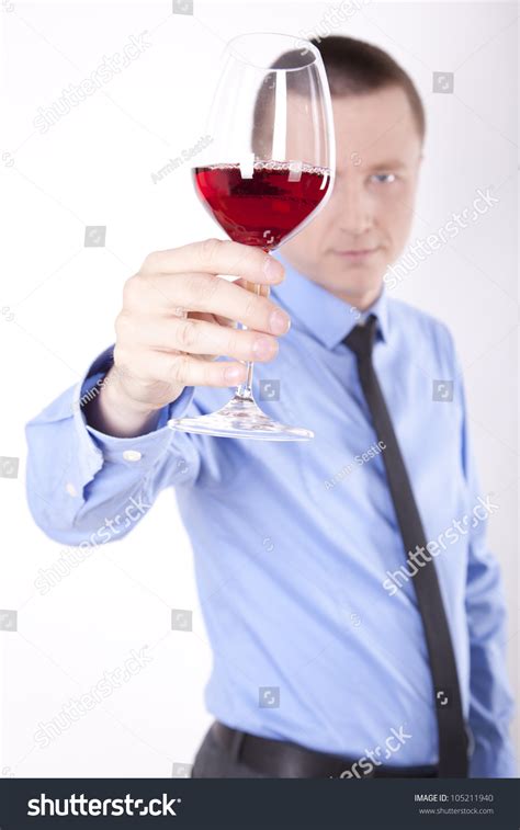 Check out our holding a wine glass selection for the very best in unique or custom, handmade pieces from our shops. Portrait Of A Successful Young Business Man Holding Glass Of Wine. Stock Photo 105211940 ...