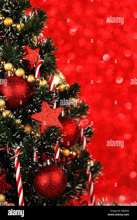 Beautiful Decorated Christmas Tree On Glitter Background Stock Photo