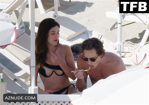 rainey qualley sexy seen flaunting her hot figure wearing a bikini with lewis pullman in