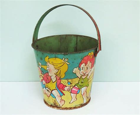 Vintage Us Metal Tin Toy Sand Pail Bucket With A Beach Scene Of
