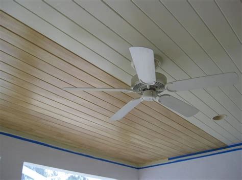 Camouflage an outdated popcorn ceiling with wooden panels. Interior: Beadboard Wood Ceiling Panels With Ceiling Fan ...
