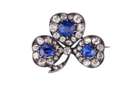 Lot 31 A Sapphire And Diamond Clover Brooch Circa