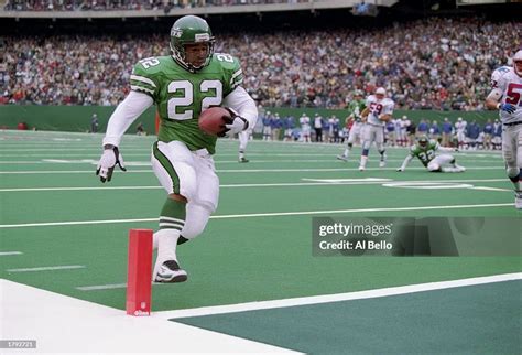 Running Back Lorenzo Neal Of The New York Jets Runs Into The End Zone