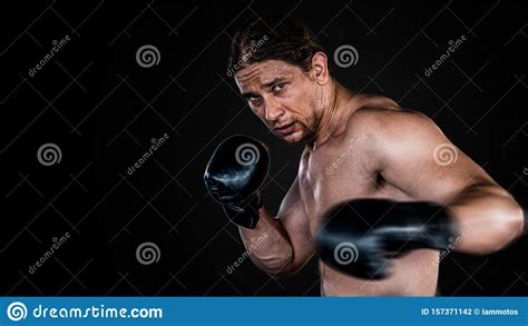 Muscular Man Boxing With Gloves Boxer Punching Fist Movement Stock