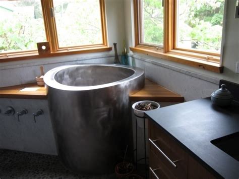 Japanese soaking tubs are usually small and deep but big in height while measuring about they are made with seats while the faucet and drain are positioned at the opposite end of the seat. Soaking Tubs For Small Bathrooms - Bathtub Designs