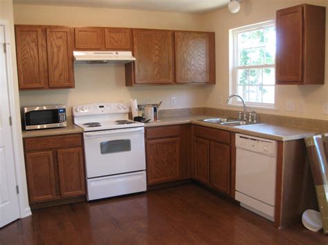 Trim, floor, cabinets and more. Remodelaholic | Painting Oak Cabinets White and Gray