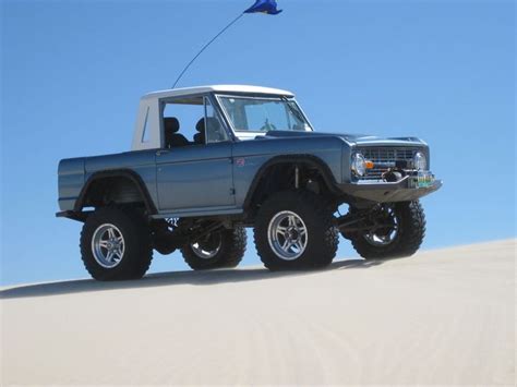 Blue Half Cab Classic Ford Bronco In The Dunes Bronco Truck Ford