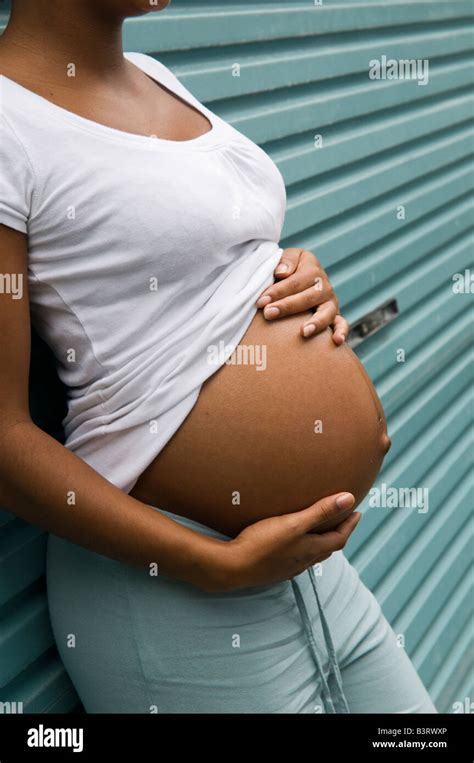 belly black teen is pregnant in skirt pregnantbelly