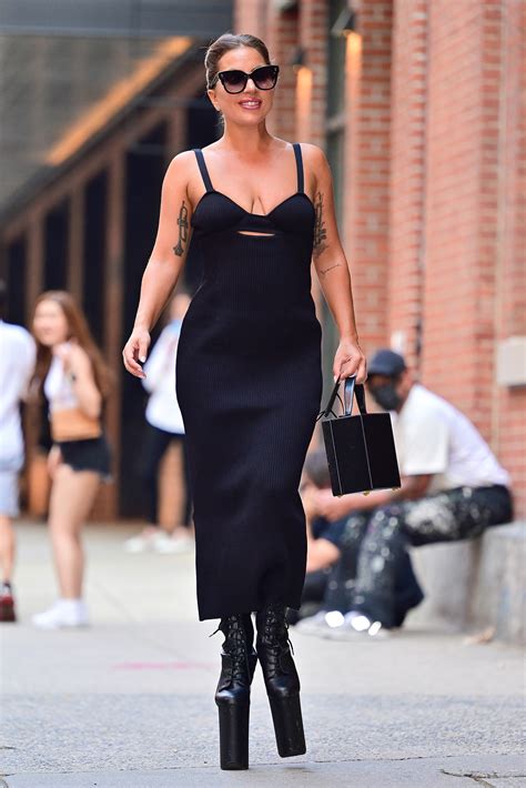 lady gaga steps out in 9 inch platform heels and black dress