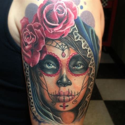 mexican traditional style colored shoulder tattoo of woman portrait with flowers tattooimages