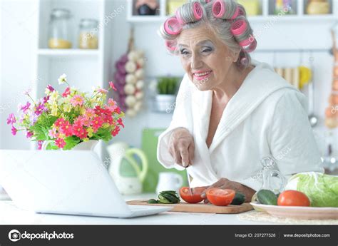 Senior Woman In Hair Rollers Stock Photo By ©aletia 207277528